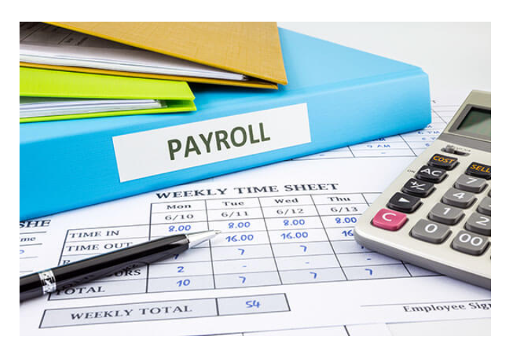 Nonprofit payroll timesheets and document binder.