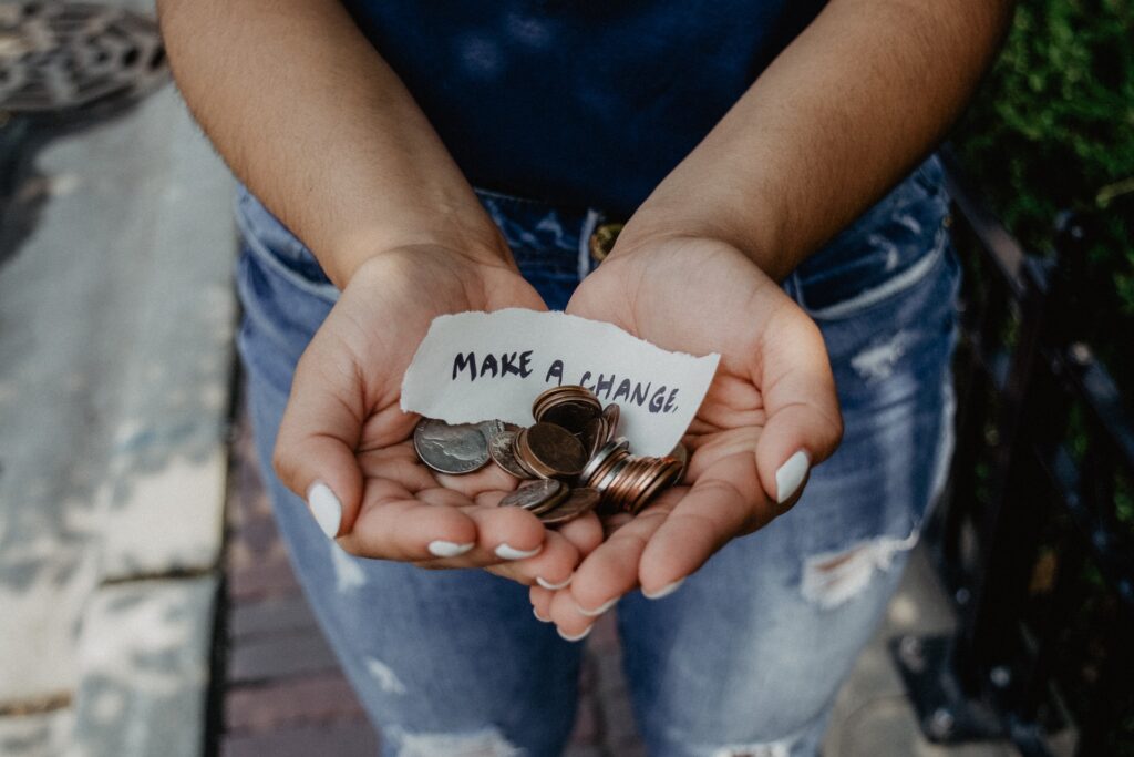 person collecting change for a nonprofit charity
